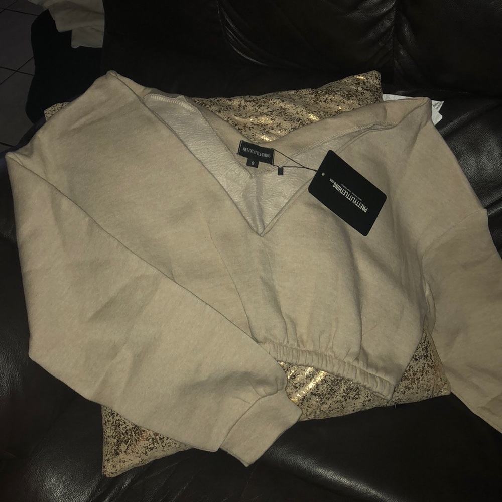 nude cropped off the shoulders sweater